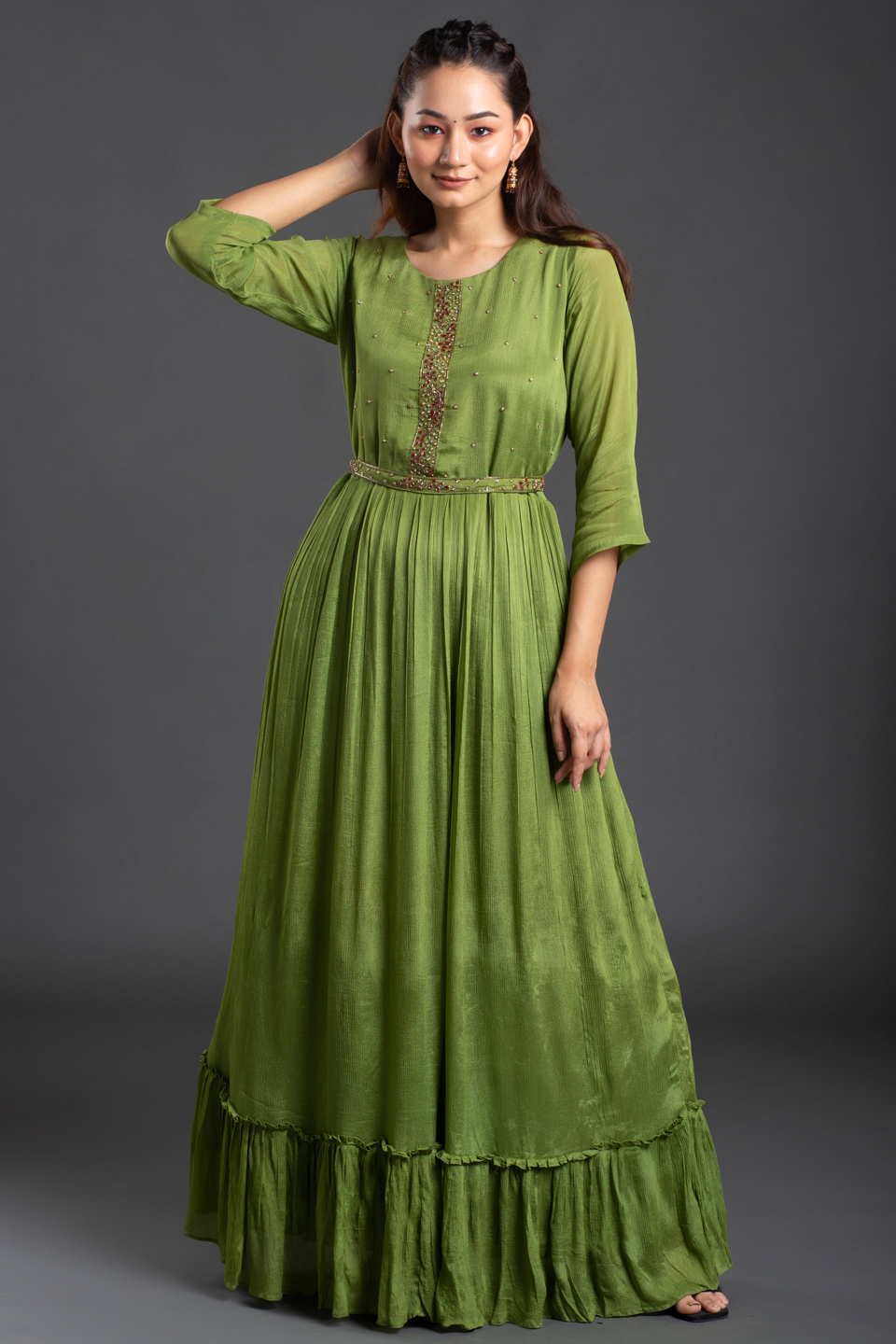 GREEN GOWN WITH PEPLUM FLARE